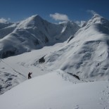David cresting the summit ridge of Resilience Peak