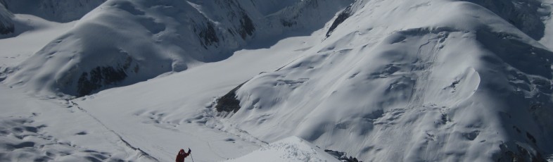 David cresting the summit ridge of Resilience Peak